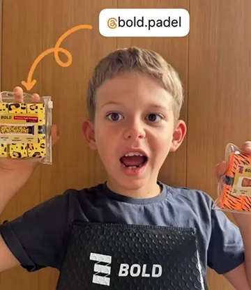 Young padel player with Bold overgrip