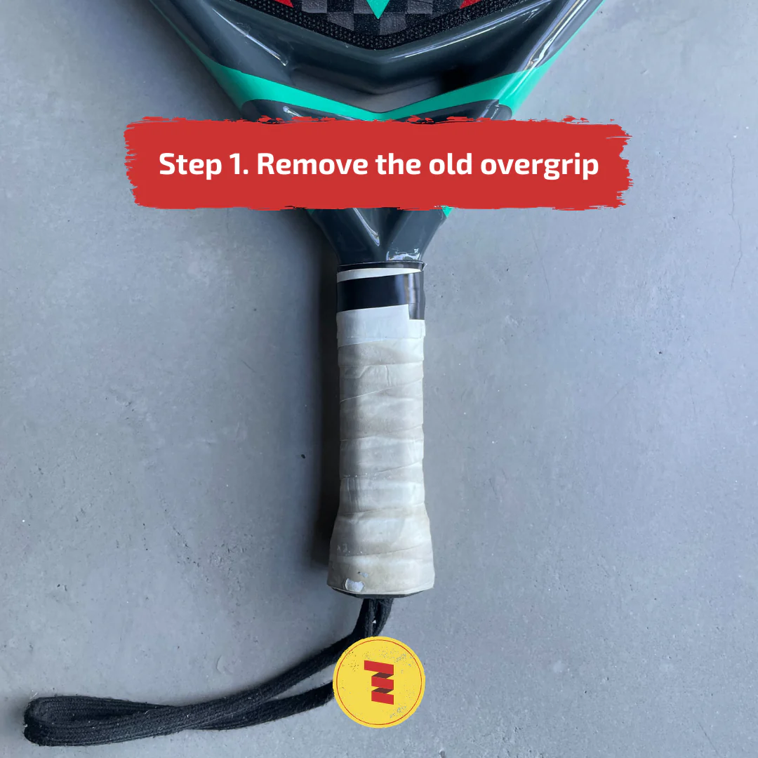 Removing the old overgrip from a padel racket handle